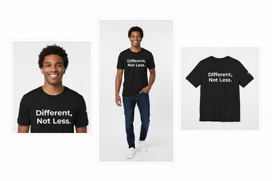 Black t-shirt with 'Different, Not Less.' text worn by a person on a white background
