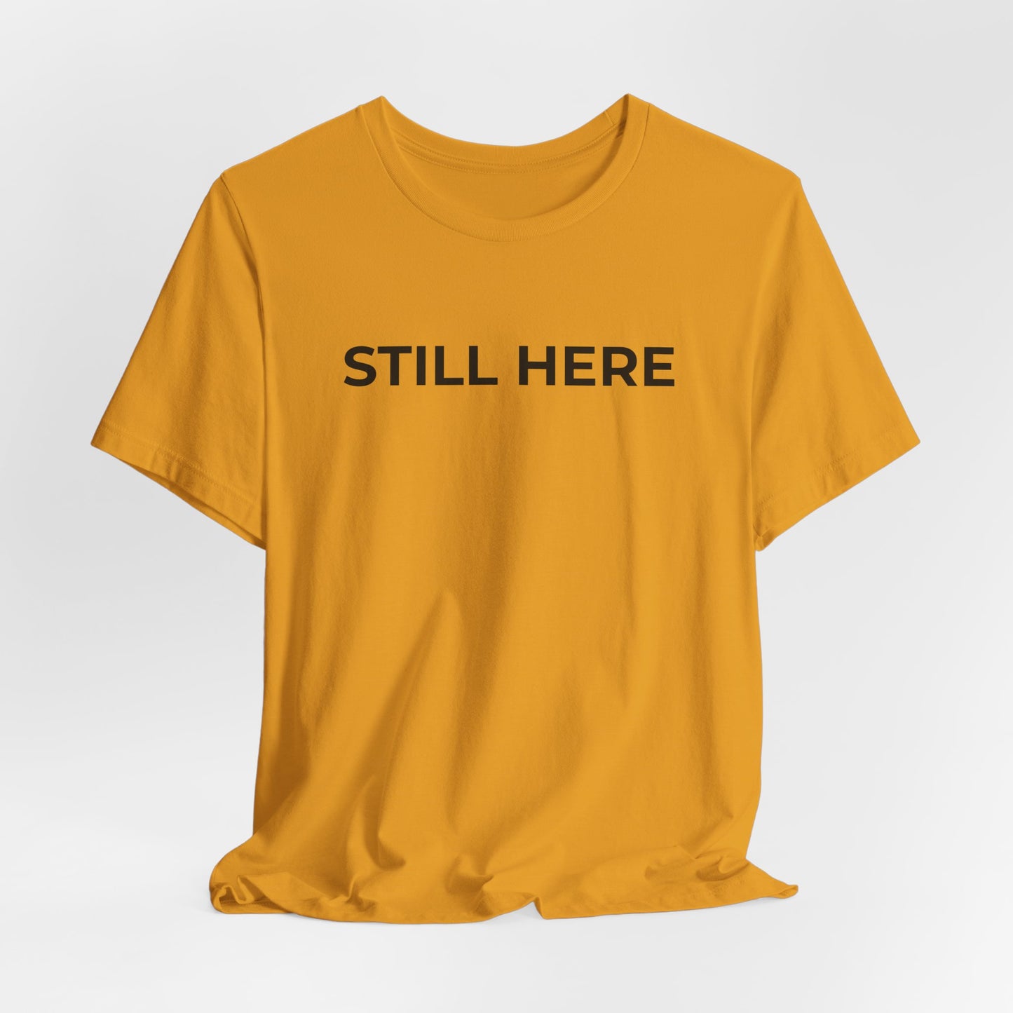 Mental Health T-Shirt - Still Here: Wear Your Strength and Resilience - Wear What You Stand For Products