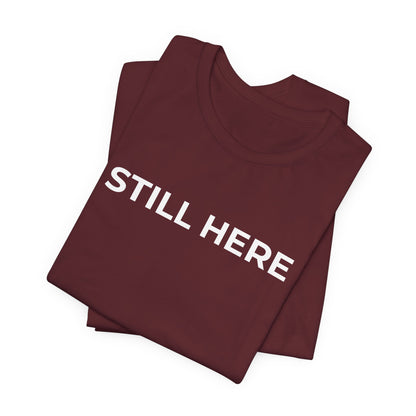 Mental Health T-Shirt - Still Here: Wear Your Strength and Resilience - Wear What You Stand For Products