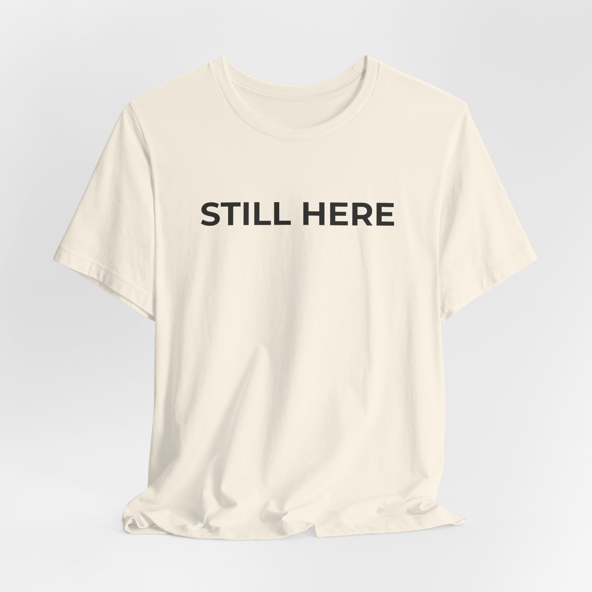 Mental Health T-Shirt - Still Here: Wear Your Strength and Resilience - Wear What You Stand For Products