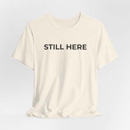 Mental Health T-Shirt - Still Here: Wear Your Strength and Resilience - Wear What You Stand For Products