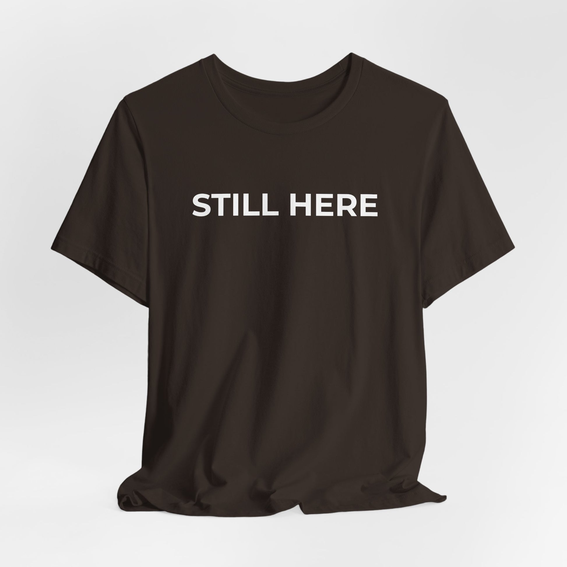 Mental Health T-Shirt - Still Here: Wear Your Strength and Resilience - Wear What You Stand For Products