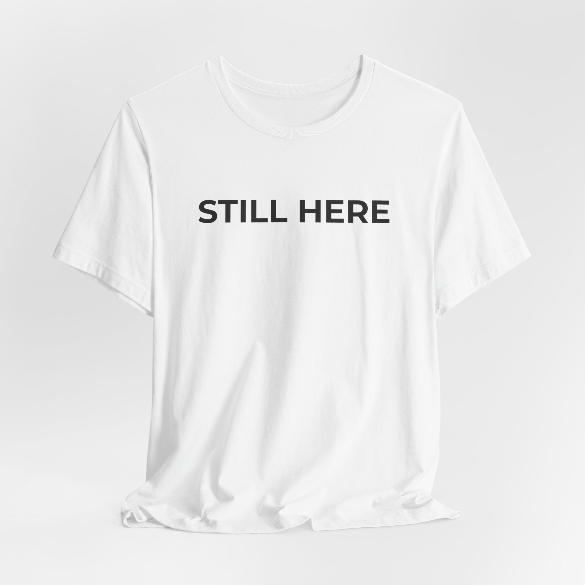 Mental Health T-Shirt - Still Here: Wear Your Strength and Resilience - Wear What You Stand For Products