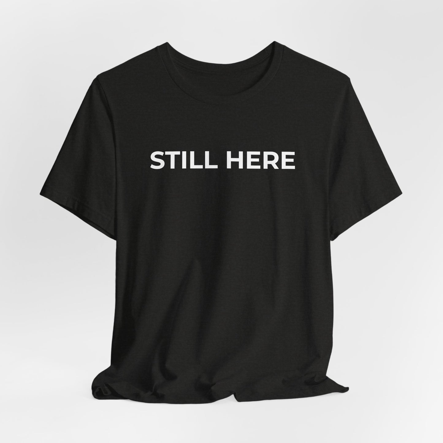 Mental Health T-Shirt - Still Here: Wear Your Strength and Resilience - Wear What You Stand For Products
