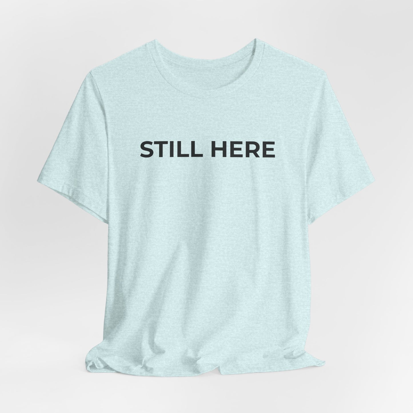 Mental Health T-Shirt - Still Here: Wear Your Strength and Resilience - Wear What You Stand For Products