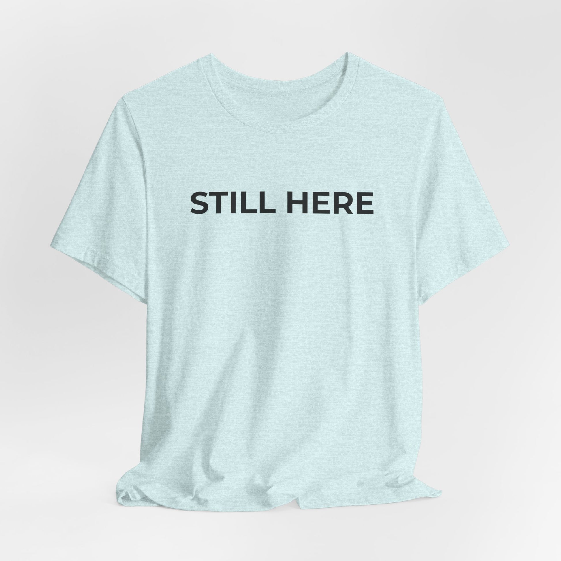 Mental Health T-Shirt - Still Here: Wear Your Strength and Resilience - Wear What You Stand For Products