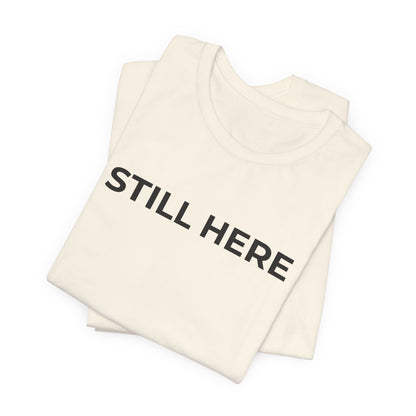 Mental Health T-Shirt - Still Here: Wear Your Strength and Resilience - Wear What You Stand For Products