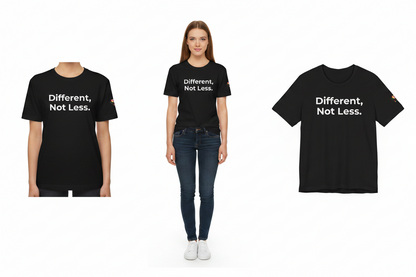 Black t-shirt with 'Different, Not Less.' text worn by a person on a white background