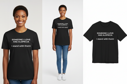 Person wearing a black t-shirt with a message about alopecia, standing next to the shirt on a white background