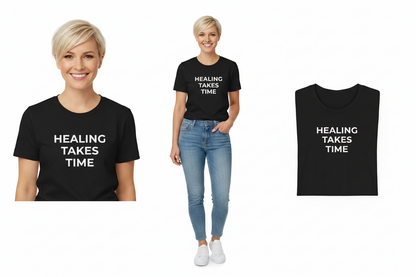 Person wearing a black t-shirt with 'HEALING TAKES TIME' text, standing next to a plain black t-shirt.