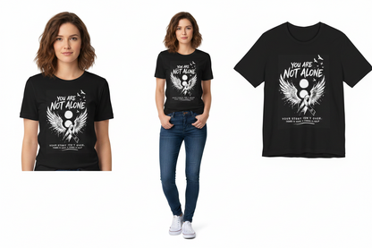 Two people wearing black t-shirts with a motivational design on a white background