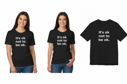 Two people wearing black t-shirts with 'It's ok not to be ok.' text, and a third t-shirt displayed separately.