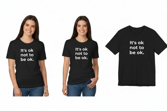 Two people wearing black t-shirts with 'It's ok not to be ok.' text, and a third t-shirt displayed separately.